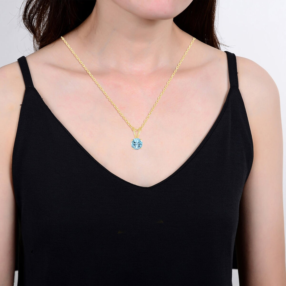 Gold Over Sterling Silver Natural Sky Blue Topaz Solitaire Pendant