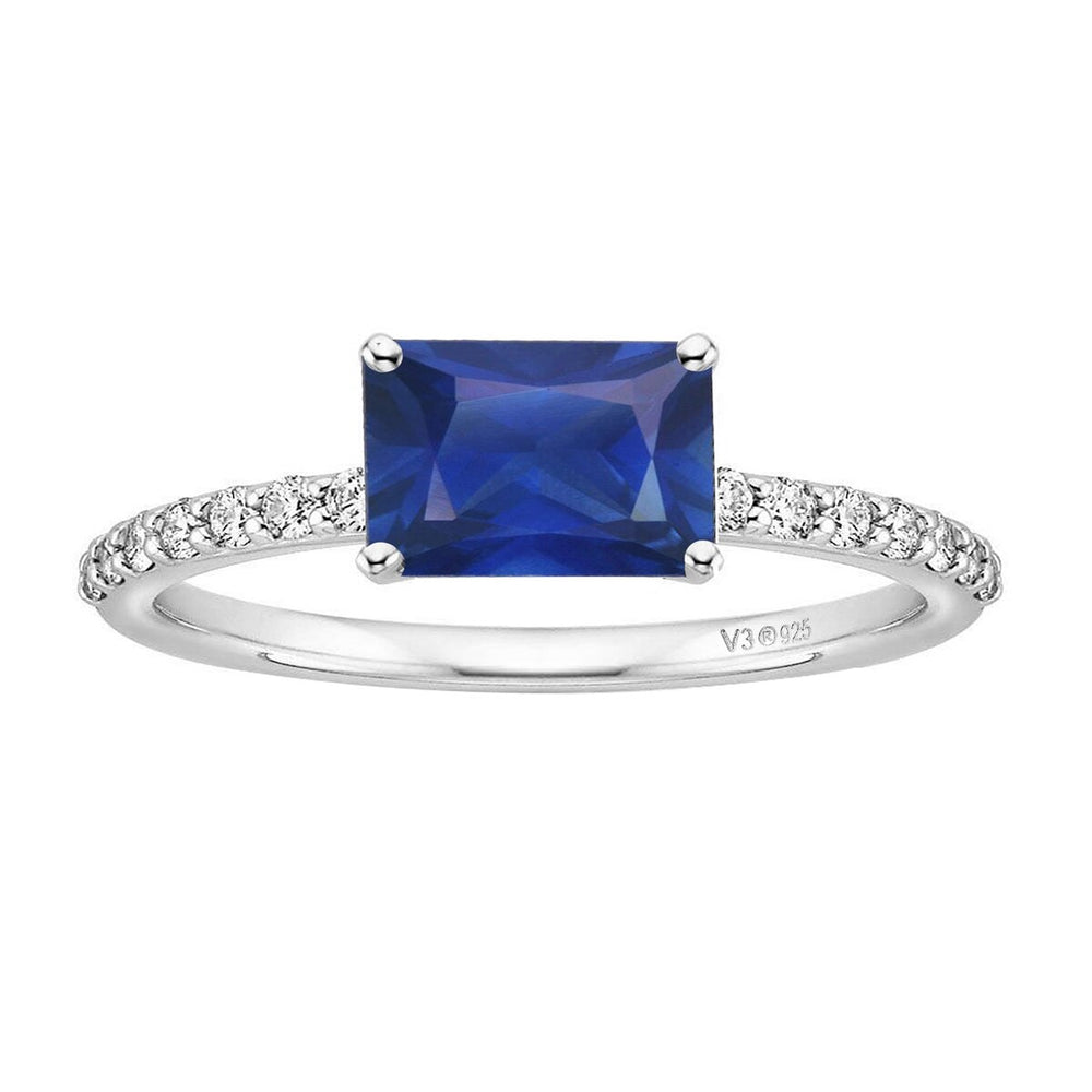 Blue Sapphire and White Topaz Sterling Silver Emerald Cut Engagement Ring