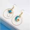 Goldtone Blue Asymmetrical Moon And Planet Drop Earrings