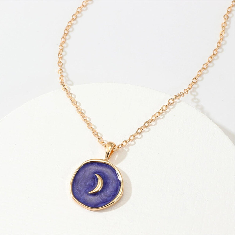 Goldtone Blue Circular Moon Pendant Necklace - White