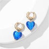 Goldtone Blue Heart Huggie Earrings