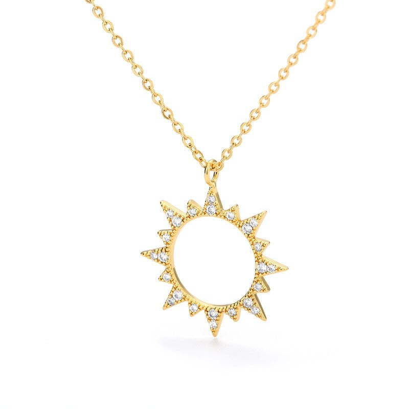 Goldtone Crystal Open Sun Pendant Necklace - White