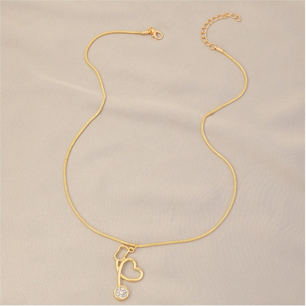 Goldtone Crystal Stethoscope Necklace - White