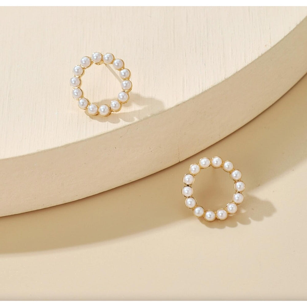 Goldtone Imitation Pearl Open Circle Stud Earrings