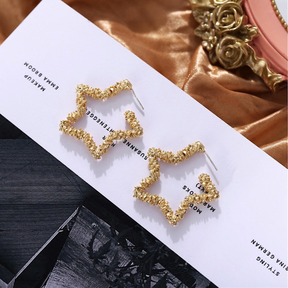 Goldtone Open Star Earrings