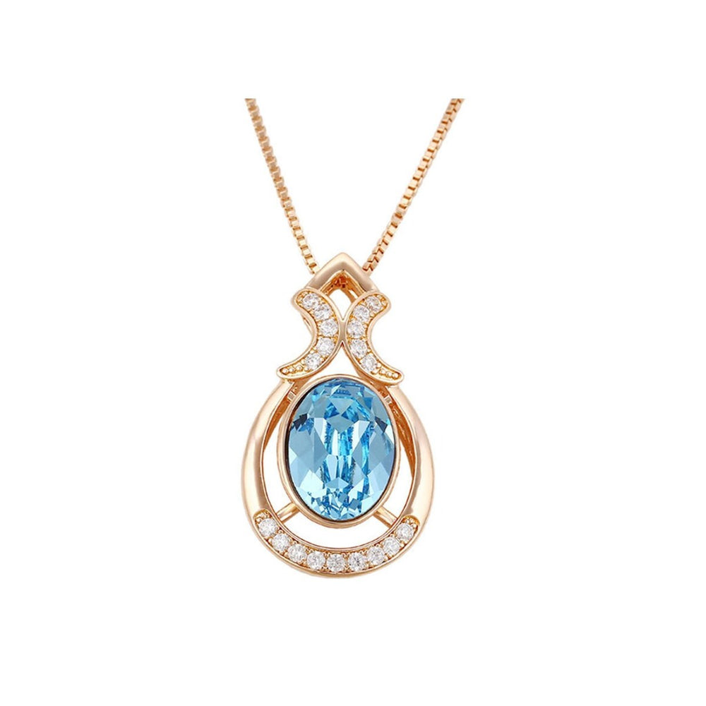 Goldtone Oval Crystal Ornate Pendant Necklace - White