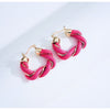 Goldtone Pink Twisted Hoop Earrings