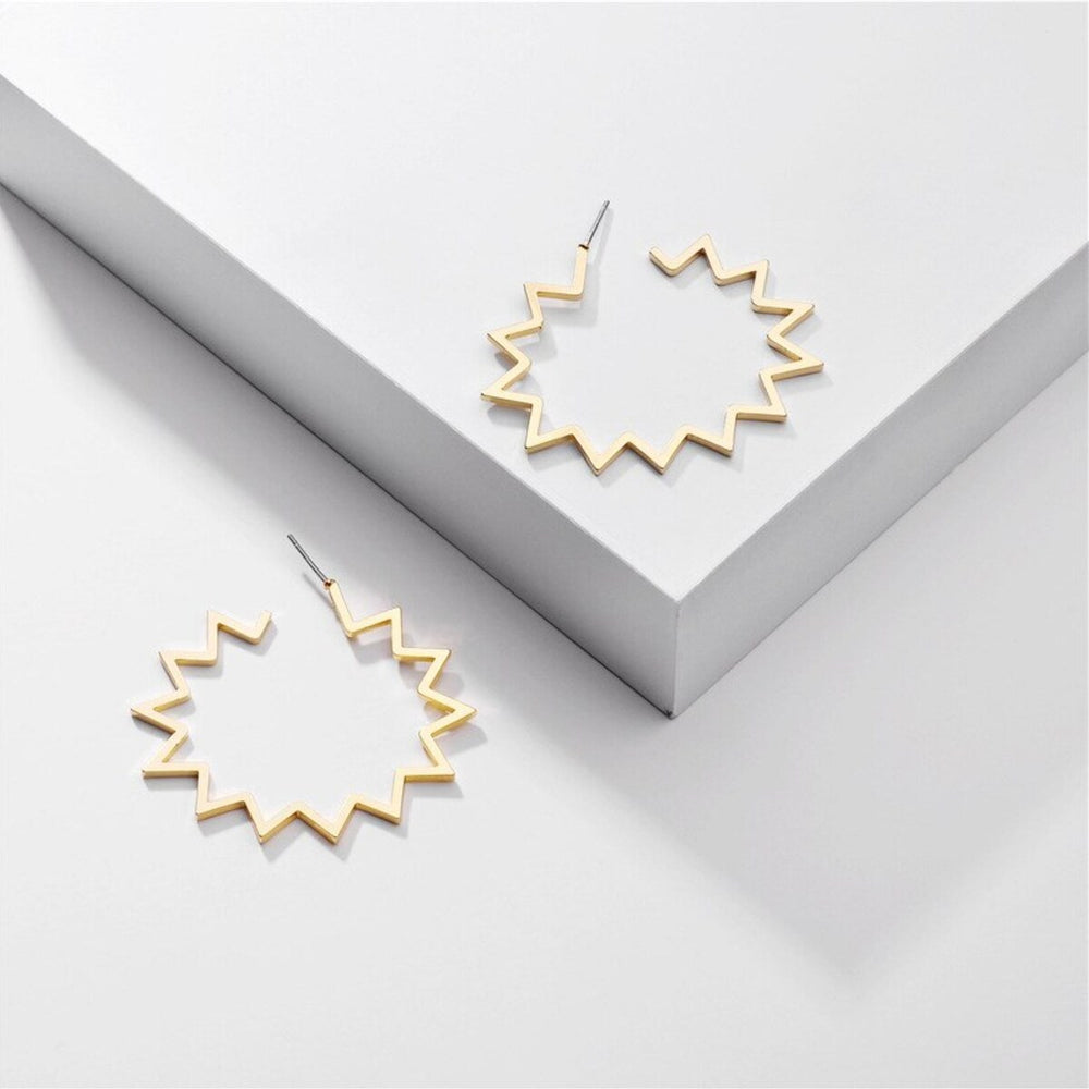 Goldtone Sunburst Open Earrings