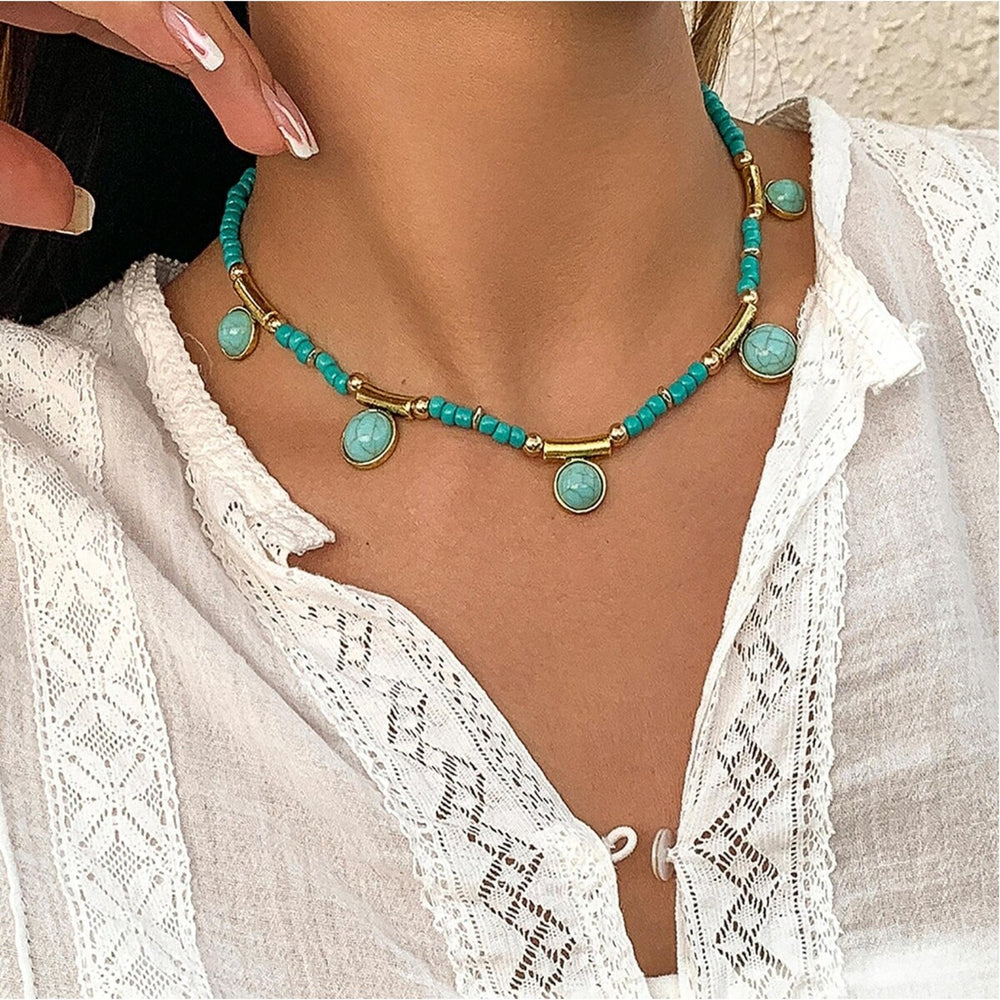 Goldtone Teal Beaded Necklace With Faux Turquoise Charms - White