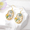 Goldtone Transparent & Floral Abstract Face Drop Earrings