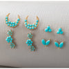 Goldtone Turquoise Crescent Moon Triplet Set Of 4 Stud Earrings