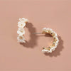 Goldtone White Flowers Huggie Hoop Earrings