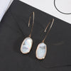 Goldtone White Oval Threader Earrings