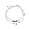 Imitation Pearl Multi-strand Bow Necklace - White