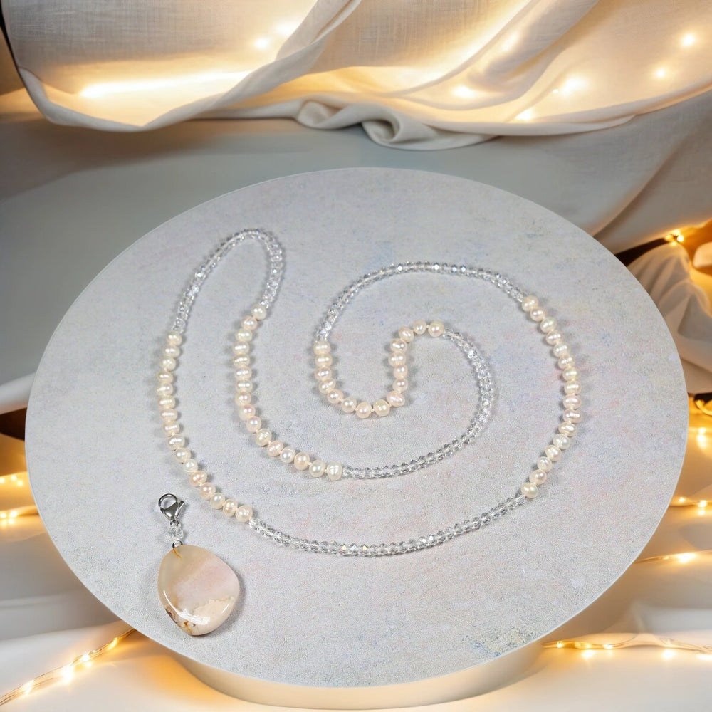 Infinity Station Necklace made of Potato freshwater pearls and glass crystals, with a detachable pendant.