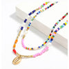 Multi Colored Beaded Layered Necklace With Goldtone Shell - White