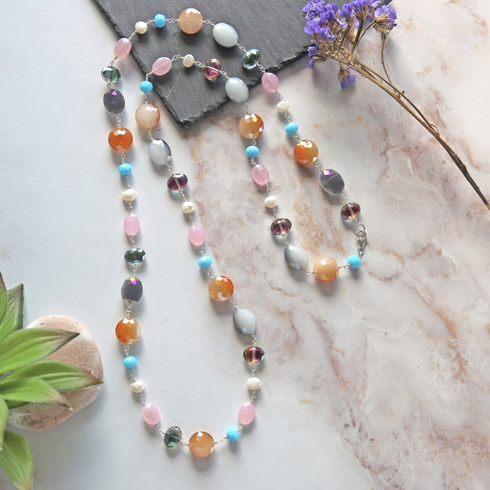 Rosary Style Multi-color Crystal and Cultured Pearl Necklace.