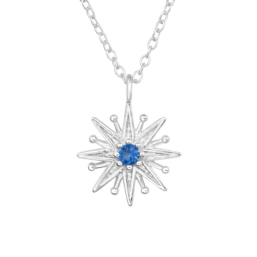 Sterling Silver Starburst Pendant Necklace with Blue Cubic Zirconia - White