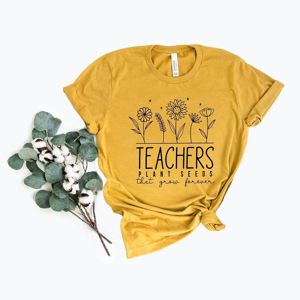 Teachers Plant Seeds That Grow Forever Short Sleeve Crewnneck Tee