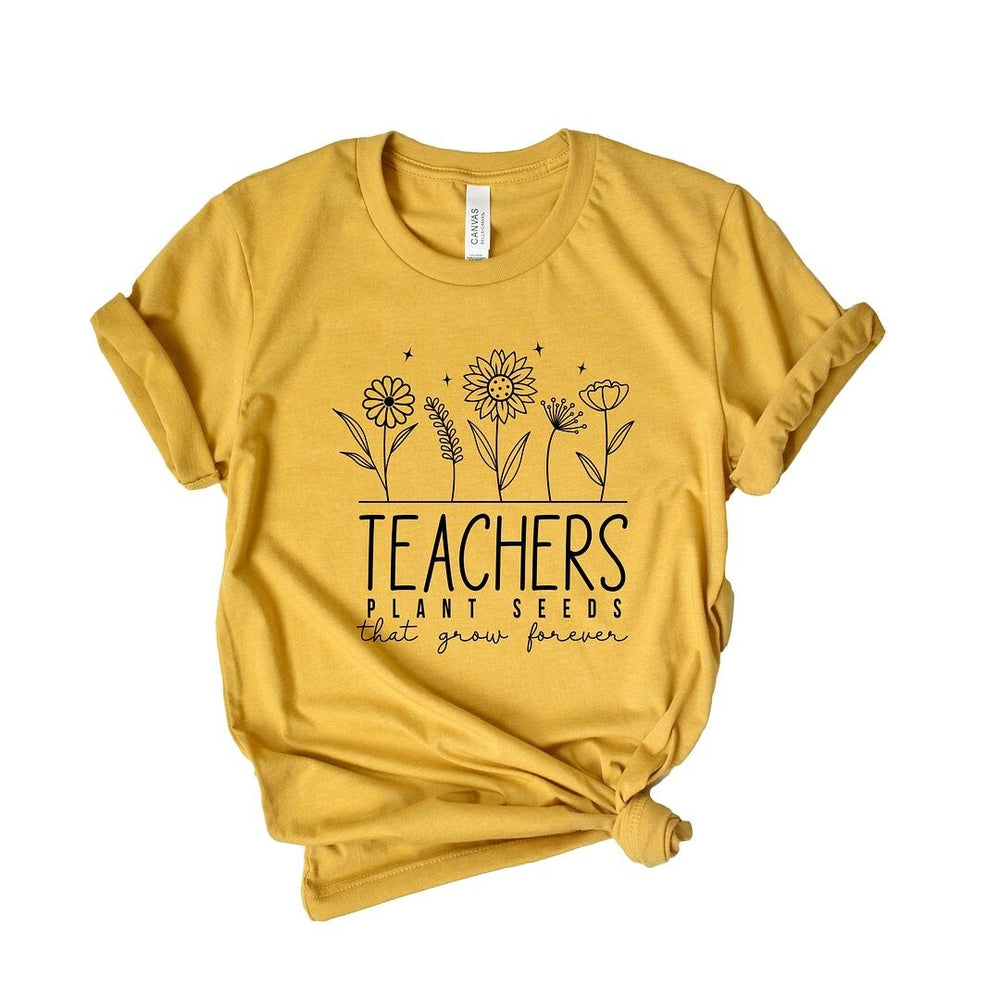 Teachers Plant Seeds That Grow Forever Short Sleeve Crewnneck Tee