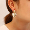 White Cheetah Heart Huggie Hoop Earrings